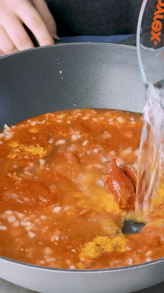 Stir everything together and add water to create the curry sauce. Allow the curry to simmer, and then add the meatballs (kofta) to the sauce. 